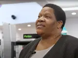 A middle aged woman in a library