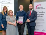 The City Mayor of Salford presenting an award