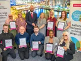 The City Mayor and some of the winners at an awards event 