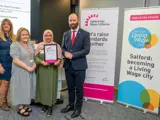 The City Mayor of Salford presenting an award