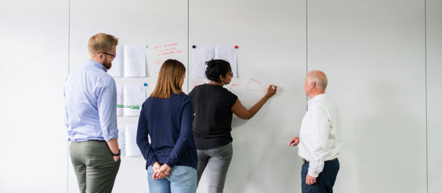 A small group of people working together on a project