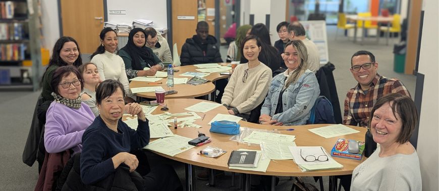 A group of students sat around a table