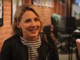 A woman sat in an office