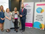The City Mayor of Salford presenting an award